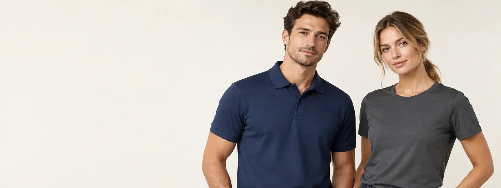 AI-generated illustrative comparison of models wearing a plain navy polo and charcoal work T-shirt