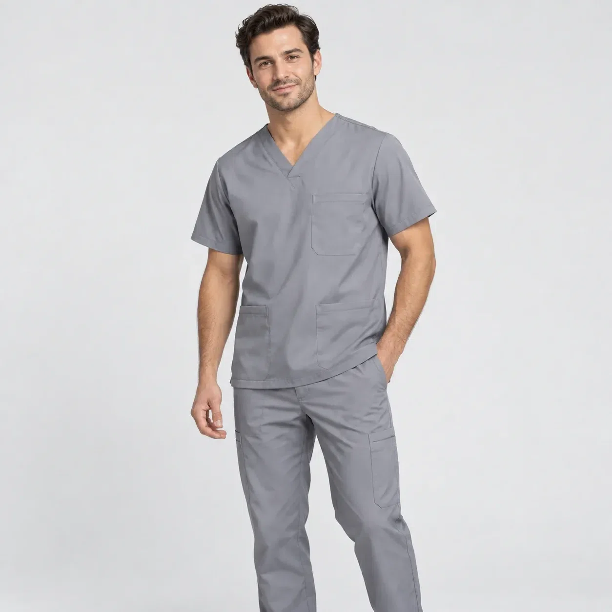 Illustrative studio image of a gray medical scrub set