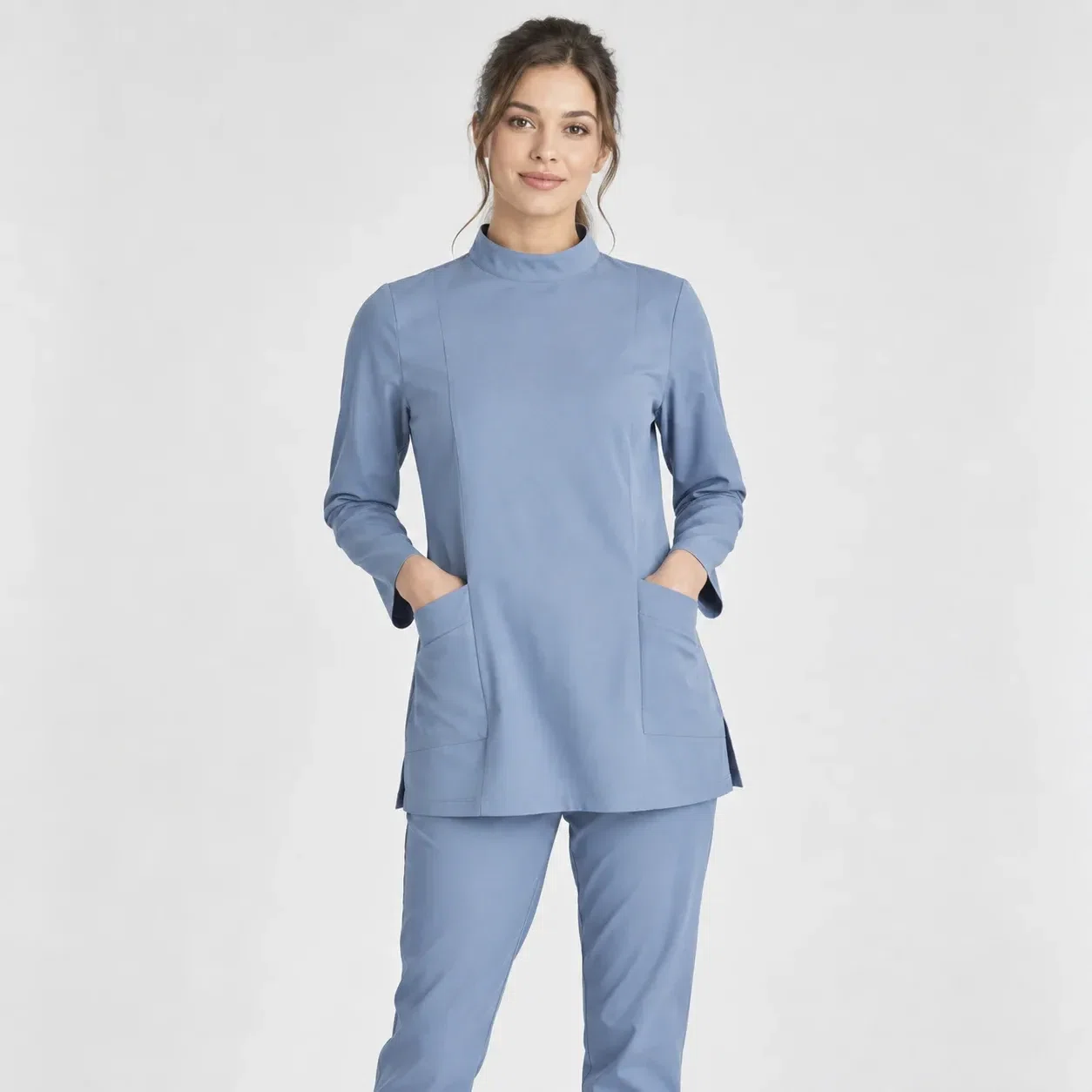 Illustrative studio image of a long-sleeve healthcare tunic