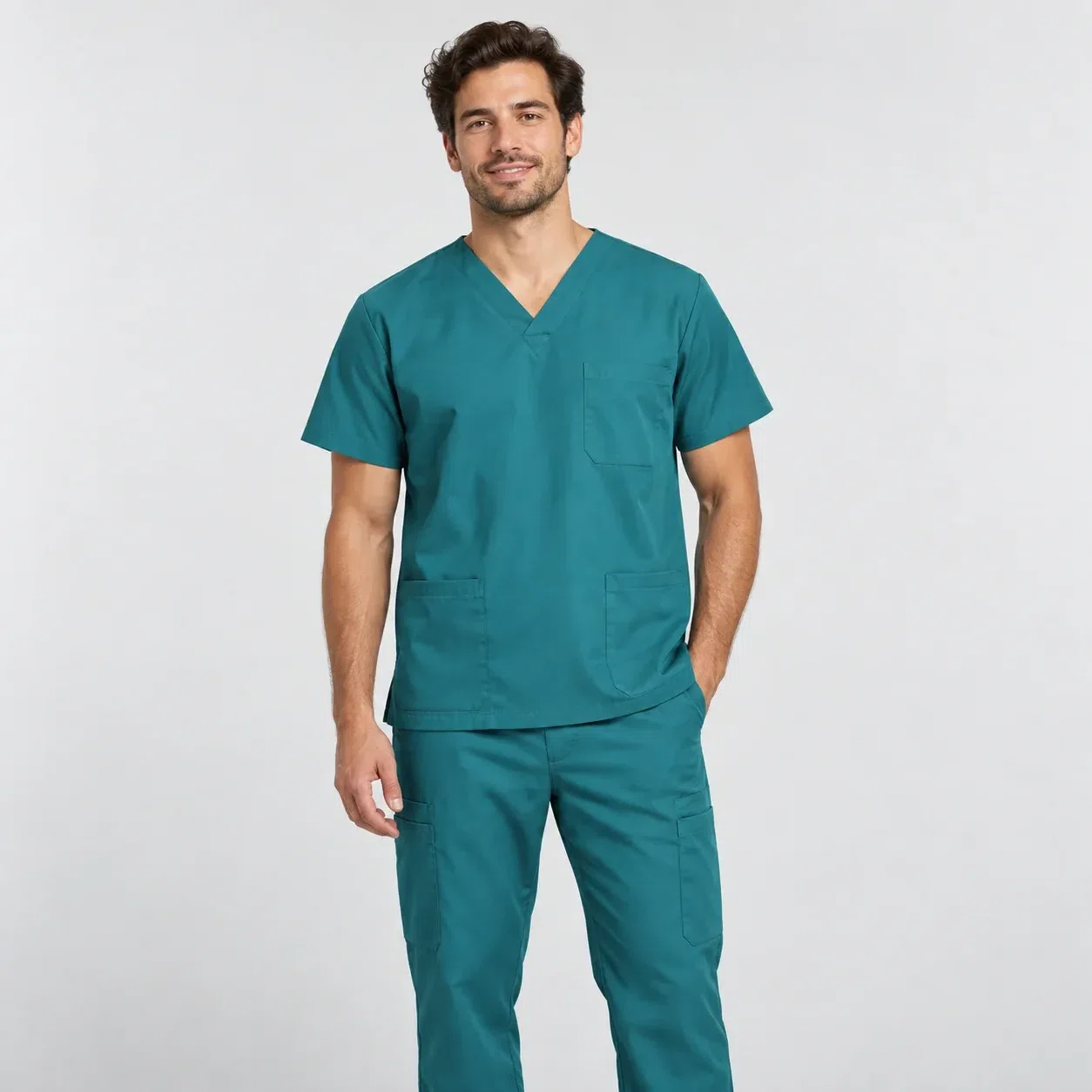 Illustrative studio image of a teal medical scrub set